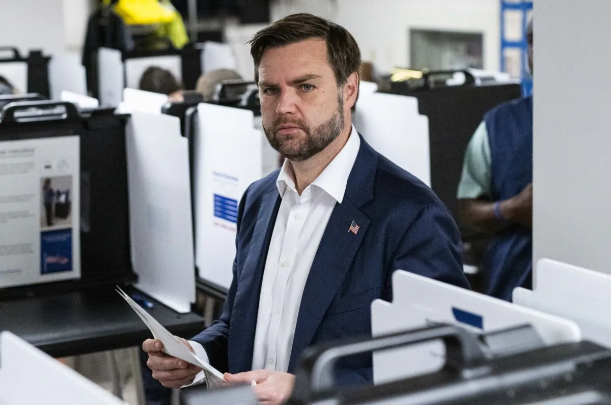Republican nominee for vice president U.S. Sen. JD Vance (R-Ohio) carries his ballot at a polling place in Cincinnati, Ohio, on Nov. 5, 2024. (Stephen Maturen/Getty Images)