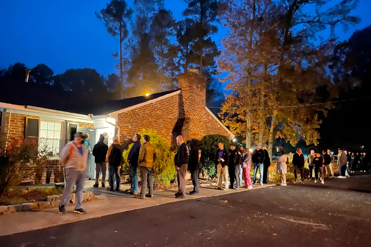 Voters line up before polls open at 6 a.m. at the Shenandoah Community Association in Richmond, Va., on Nov. 5, 2024. (Terri Wu/The Epoch Times)