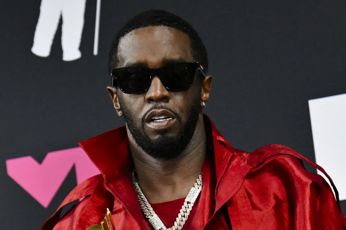 Sean "Diddy" Combs poses with the Global Icon award in the press room during the MTV Video Music Awards at the Prudential Center in Newark, N.J., on Sept. 12, 2023. (Angela Weiss/AFP via Getty Images)
