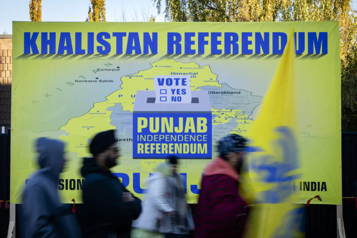 In a file photo, people line up to take part in a Khalistan referendum at a temple in Surrey, B.C., on Oct. 29, 2023. (The Canadian Press/Ethan Cairns)