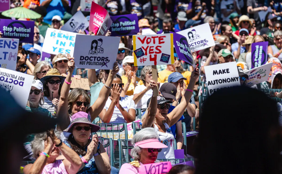 Abortion proponents hold a rally in support of the "Yes On 4" effort, in downtown Orlando on April 13, 2024. (Willie J. Allen Jr./Orlando Sentinel via AP)