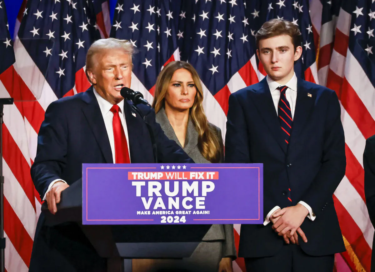 President-elect Donald Trump is joined by his wife, Melania Trump, and son Barron Trump as he speaks to supporters after winning the presidential election, in West Palm Beach, Fla., on Nov. 6, 2024. (John Fredricks/The Epoch Times)