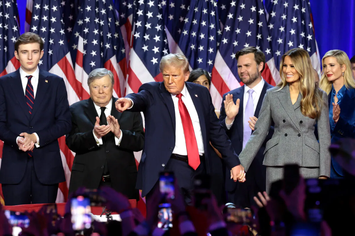 Former President Donald Trump gestures on stage during an election night event at the Palm Beach Convention Center in West Palm Beach, Fla., on Nov. 6, 2024. (Win McNamee/Getty Images)