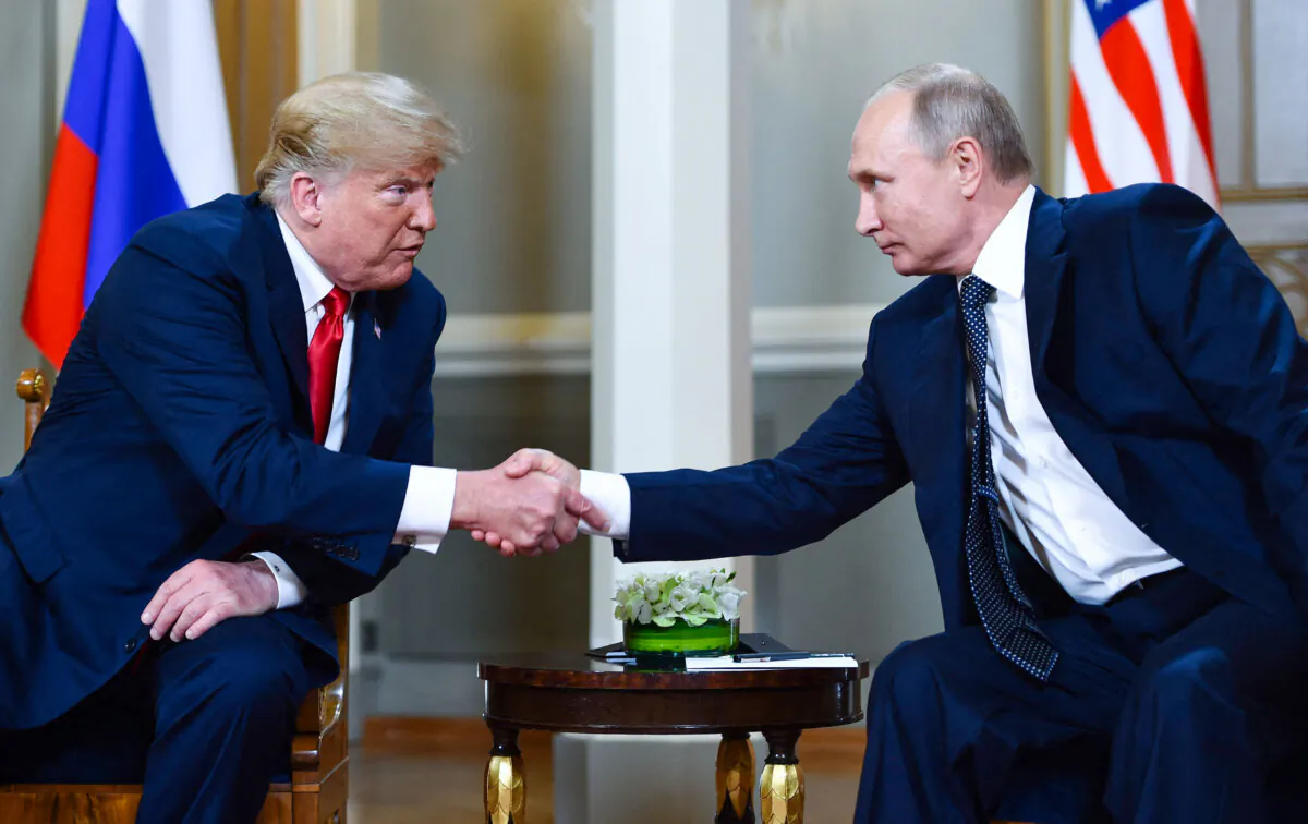 Russian President Vladimir Putin (R) and U.S. President Donald Trump shake hands before a meeting in Helsinki, Finland, on July 16, 2018. 

BRENDAN SMIALOWSKI/AFP via Getty Images