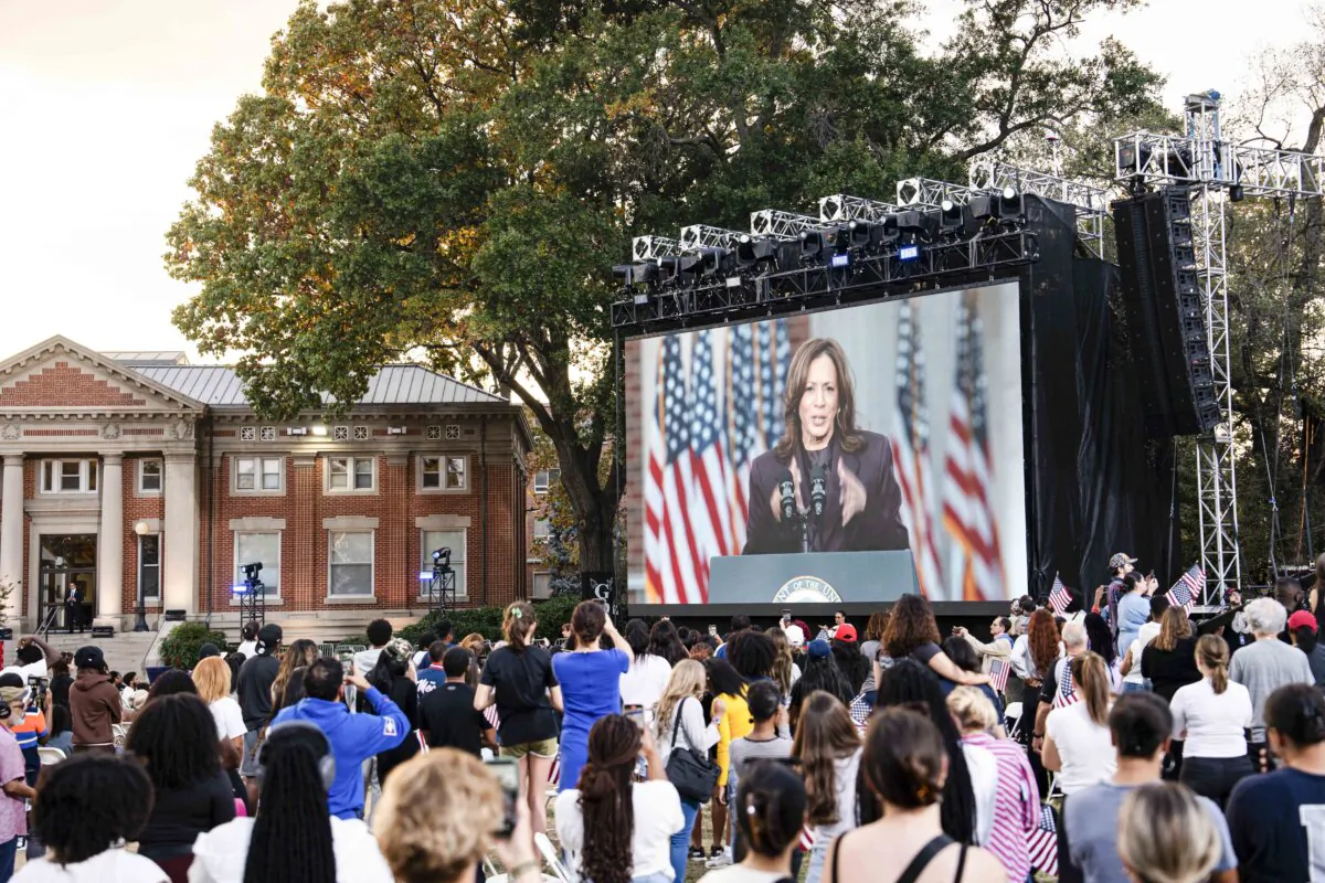 Supporters of Democratic presidential nominee Vice President Kamala Harris listen to her concession speech at Howard University in Washington on Nov. 6, 2024. (Madalina Vasiliu/The Epoch Times)