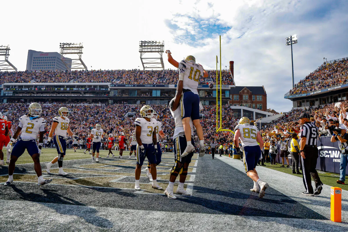 Haynes King #10 of the Georgia Tech Yellow Jackets reacts after rushing in for a touchdown during the fourth quarter against the Miami Hurricanes at Bobby Dodd Stadium in Atlanta, Ga., on Nov. 9, 2024. (Todd Kirkland /Getty Images)