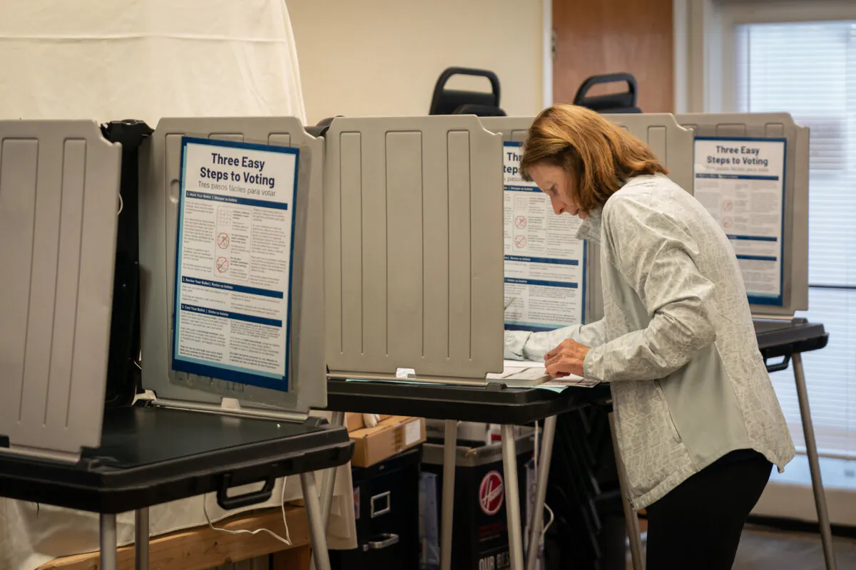 A voter casts her ballot at a polling place inside the Sunset Ministry church in San Francisco on Nov. 5, 2024. (Loren Elliott/Getty Images)