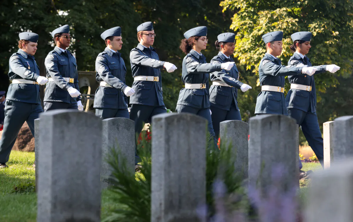 Royal Canadian Air Cadets arrive at a ceremony marking the 84th anniversary of the Battle of Britain at the National Military Cemetery in Ottawa on Sept. 15, 2024. (The Canadian Press/Patrick Doyle)
