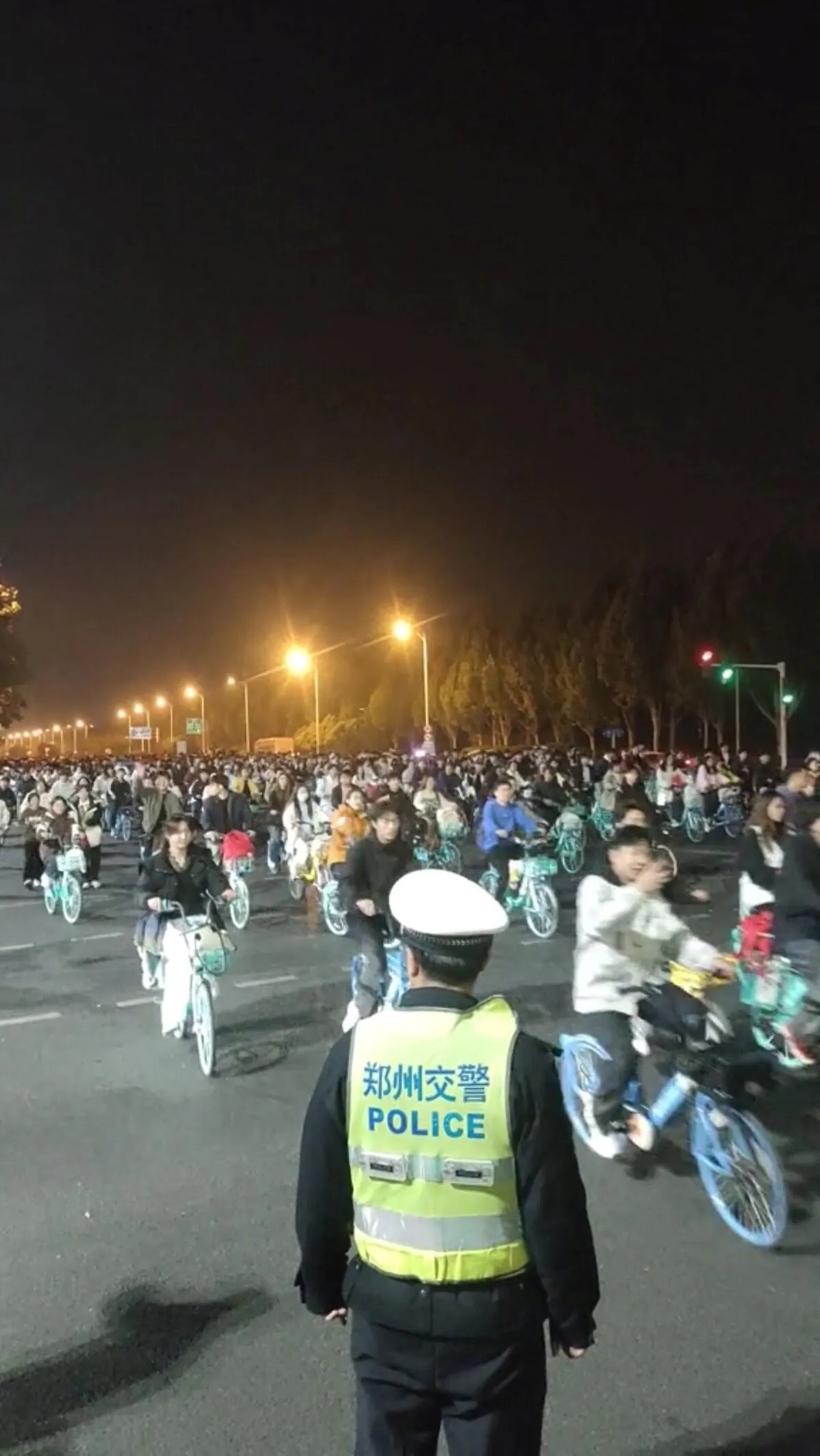 Thousands of students participate in a bike ride to Kaifeng, in search of soup dumplings, causing a highway to be clogged in Zhengzhou, Henan Province, China, in this screen grab obtained from a social media video released on Nov. 9, 2024. (Social Media/via Reuters)