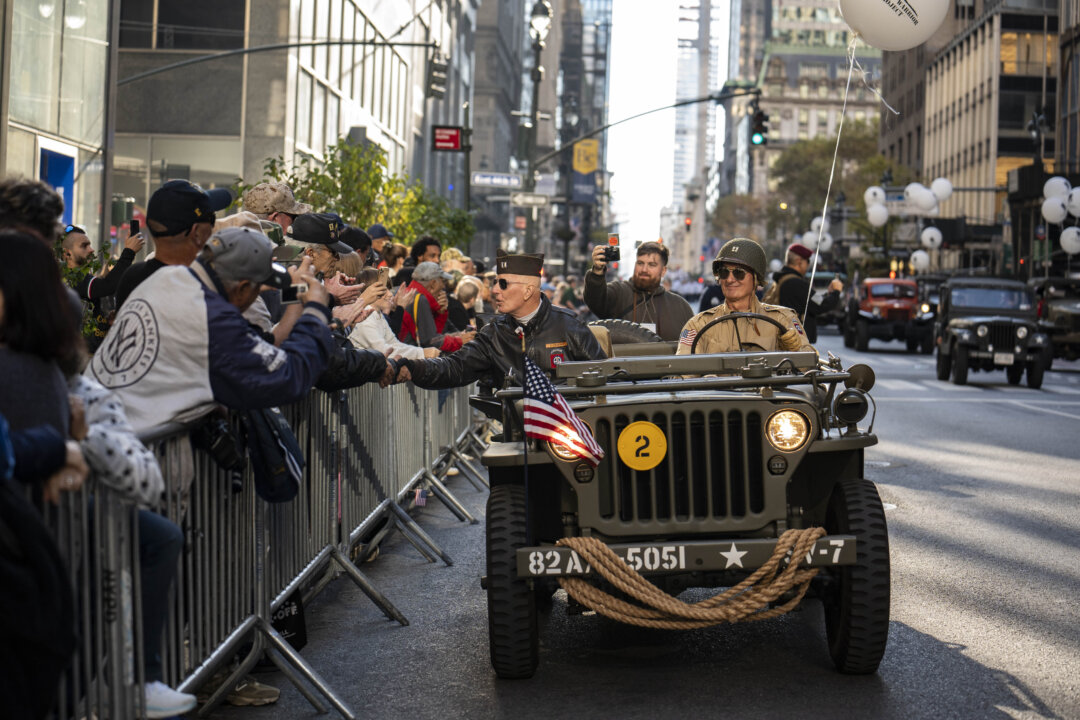 NextImg:Day in Photos: Veteran’s Day Parade, COP29 Opening, and a Bathing Baby Hippo