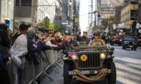 Day in Photos: Veterans Day Parade, COP29 Opening, and a Bathing Baby Hippo