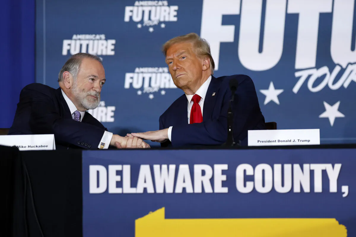 Republican presidential nominee, former President Donald Trump (R) participates in a roundtable discussion with former Arkansas Gov. Mike Huckabee at the Drexelbrook Catering & Event Center in Drexel Hill, Pa., on Oct. 29, 2024. (Chip Somodevilla/Getty Images)