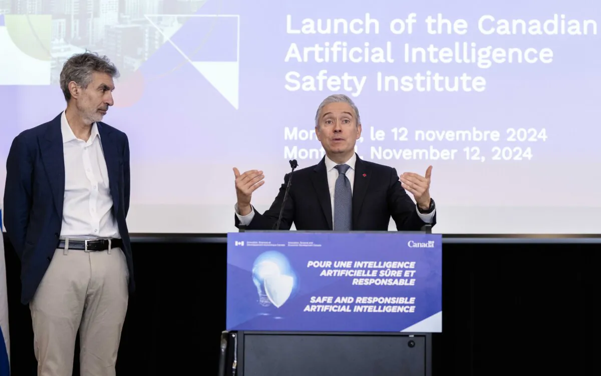 Innovation, Science, and Industry Minister Francois-Philippe Champagne (R), and founder and scientific director of MILA-Quebec Artificial Intelligence Institute Yoshua Bengio answer questions from the media following their announcement to launch the Canadian Artificial Intelligence Safety Institute in Montreal, on Nov. 12, 2024. (The Canadian Press/Christinne Muschi)