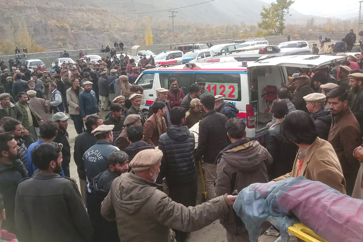Mourners carry a deceased's body who died in a wedding bus accident in Gilgit, Pakistan, on Nov. 13, 2024. (Gilgit Baltistan Emergency Service (Rescue 1122)/AFP via Getty Images