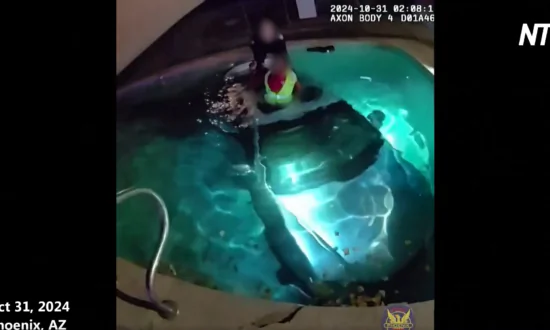 Police Rescue Man From Car Submerged in Pool