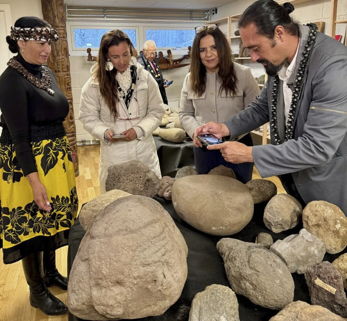 People look at artifacts taken from Easter Island, also known as Rapa Nui, at the Kon Tiki Museum in Oslo, Norway, on Nov. 12, 2024. (Kon-Tiki Museum press service via AP)