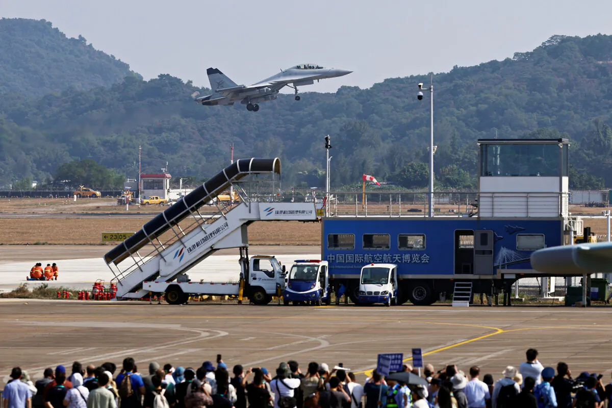 A J-15D fighter jet of the Chinese navy flies in the sky at the China International Aviation and Aerospace Exhibition, or Airshow China, in Zhuhai, Guangdong Province, China, on Nov. 12, 2024. (Tingshu Wang/Reuters)