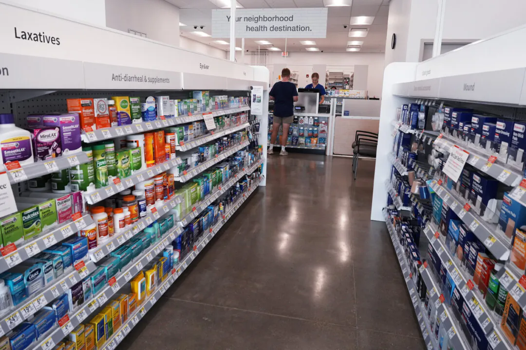Retail medications are displayed on shelves at a pharmacy in Deerfield, Ill., on July 25, 2024. (The Canadian Press/AP-Nam Y. Huh)