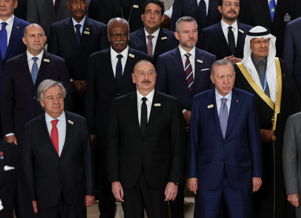 United Nations Secretary-General Antonio Guterres, Azerbaijan's President Ilham Aliyev, Turkish President Recep Tayyip Erdogan and other leaders pose for a family photo at the United Nations climate change conference, known as COP29, in Baku, Azerbaijan on Nov. 12, 2024. (Reuters/Murad Sezer)