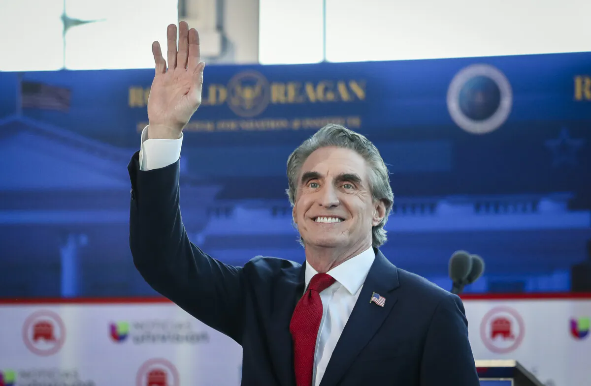 Then-presidential candidate Doug Burgum enters the debate area of the Ronald Reagan Presidential Library in Simi Valley, Calif., on Sept. 27, 2023. (John Fredricks/The Epoch Times)