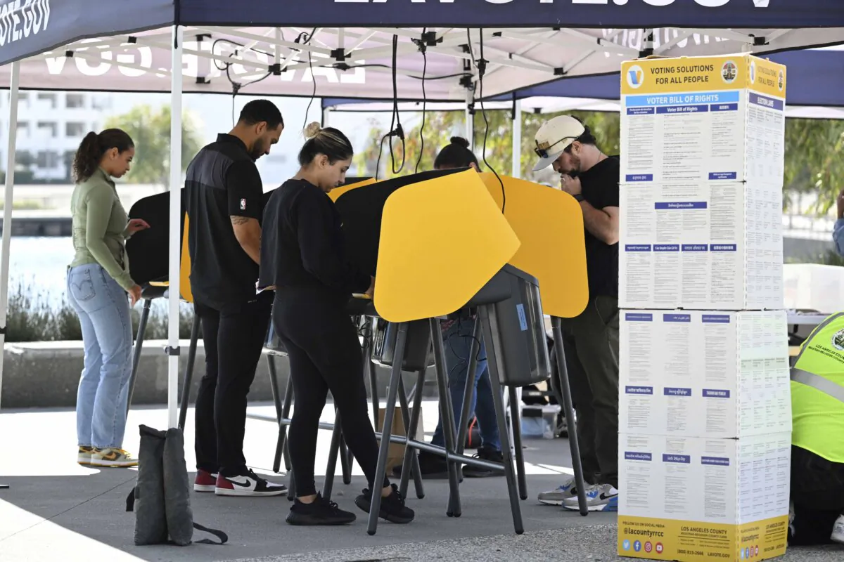People cast their ballots at a mobile outdoor vote center at SoFi Stadium in Los Angeles on Election Day, Nov. 5, 2024. (Robyn Beck/AFP via Getty Images)