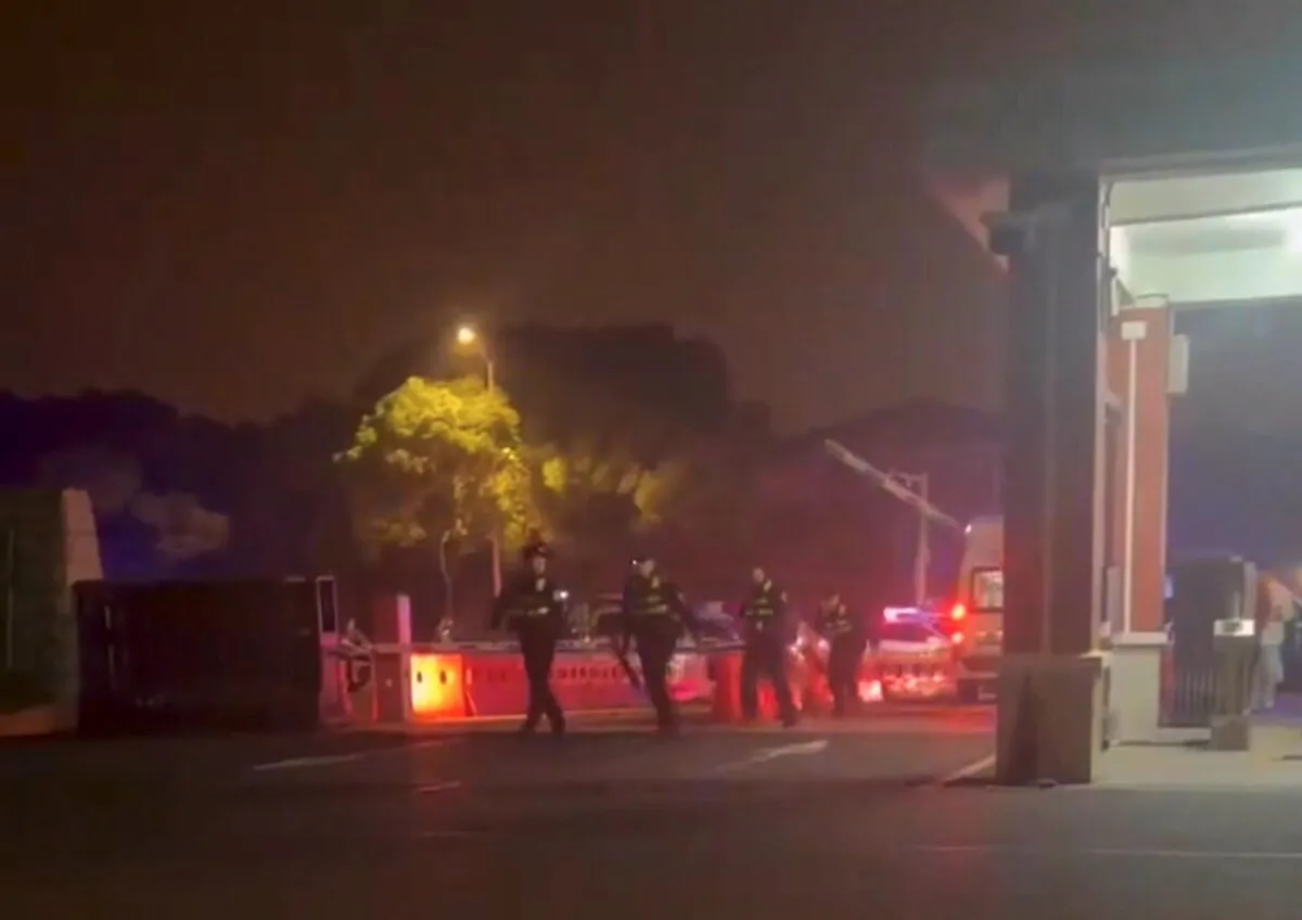 Police respond following a stabbing attack at vocational college in Yixing, Wuxi, Jiangsu Province, China, on Nov. 16, 2024, in this screen grab obtained from social media video. (Social Media/via Reuters)