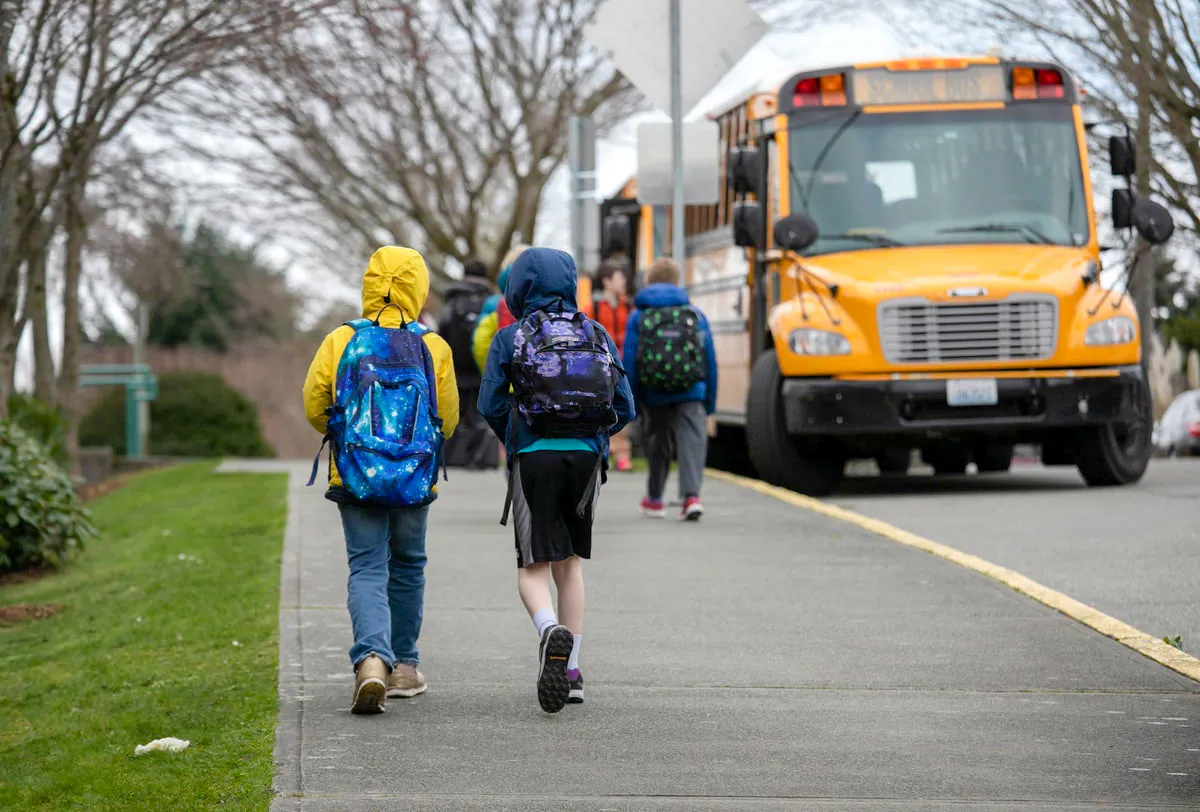 Students leave an elementary school in Seattle on March 11, 2020. (John Moore/Getty Images)
