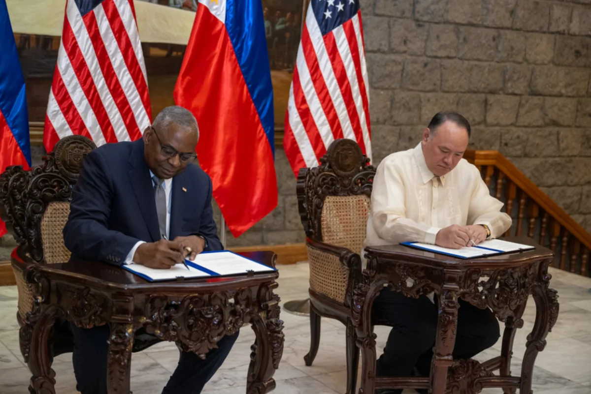 Secretary of Defense Lloyd J. Austin III (R) and Filipino Secretary of National Defense Gilbert Teodoro sign the General Security of Military Information Agreement at Camp Aguinaldo in Quezon City, Philippines, on Nov. 18, 2024. (Tech. Sgt. Jack Sanders/U.S. Air Force