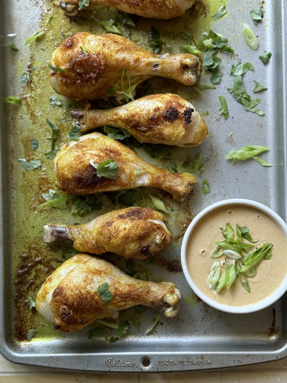 In the time it takes to heat the oven, you can season the chicken and arrange it on the roasting pan. (JeanMarie Brownson/TCA)