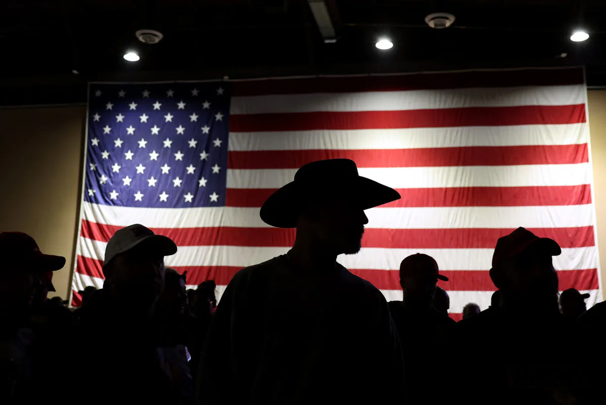 Supporters of former U.S. President Donald Trump look on before the start of a campaign rally at the Reno-Sparks Convention Center in Reno, Nev., on Dec. 17, 2023. (Justin Sullivan/Getty Images)