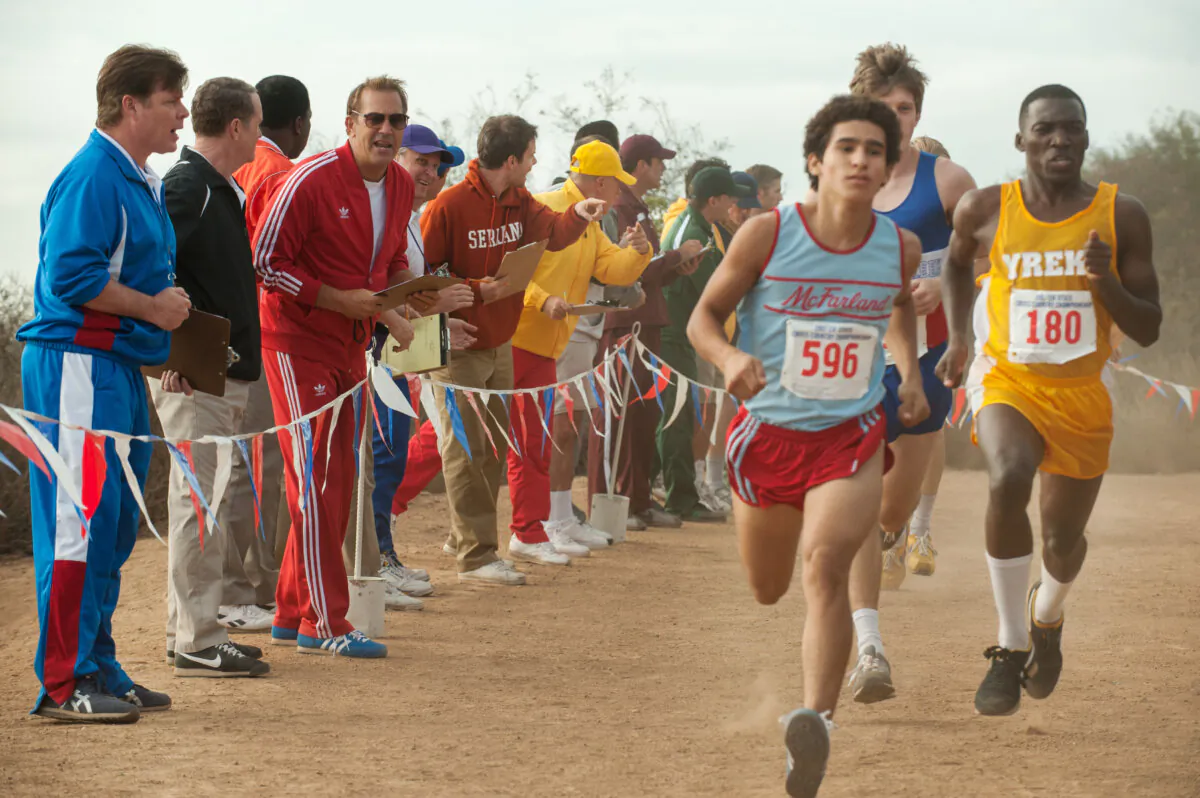 Coach Jim White (3rd from L) guides boys to believe in themselves, in "McFarland, USA." (MovieStillsDB)