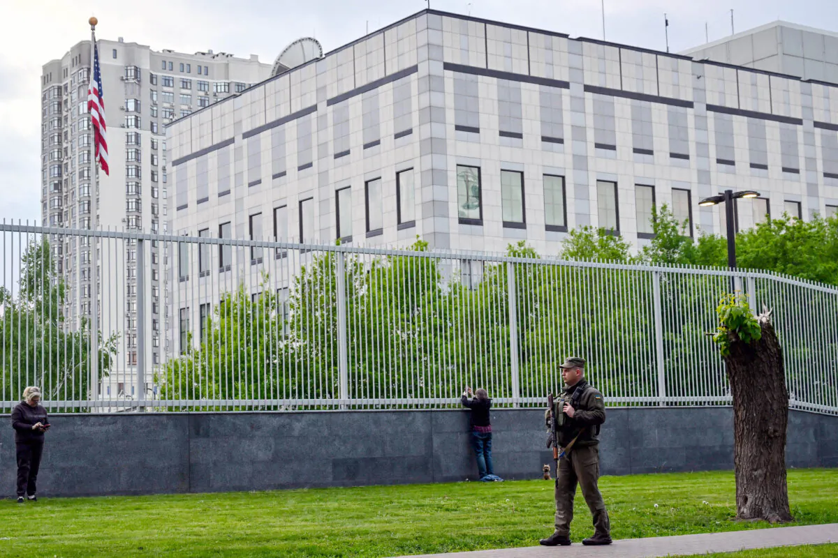 Ukrainian serviceman  outside the U.S. embassy in Kyiv, Ukraine, on May 18, 2022. (SERGEI SUPINSKY/AFP via Getty Images)