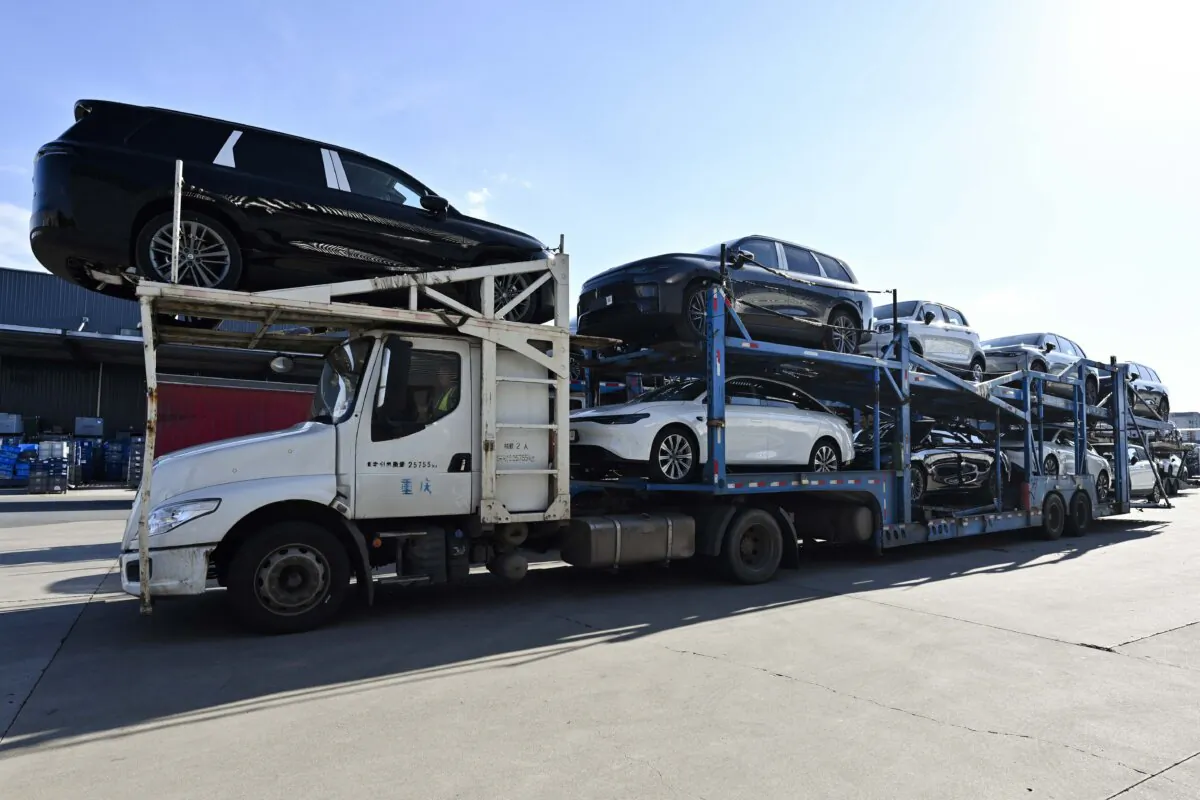 A driver prepares to transport cars at a factory of electric vehicle manufacturer Leapmotor in Jinhua, China's eastern Zhejiang Province, on Sept. 18, 2024. (Adek Berry/AFP via Getty Images)