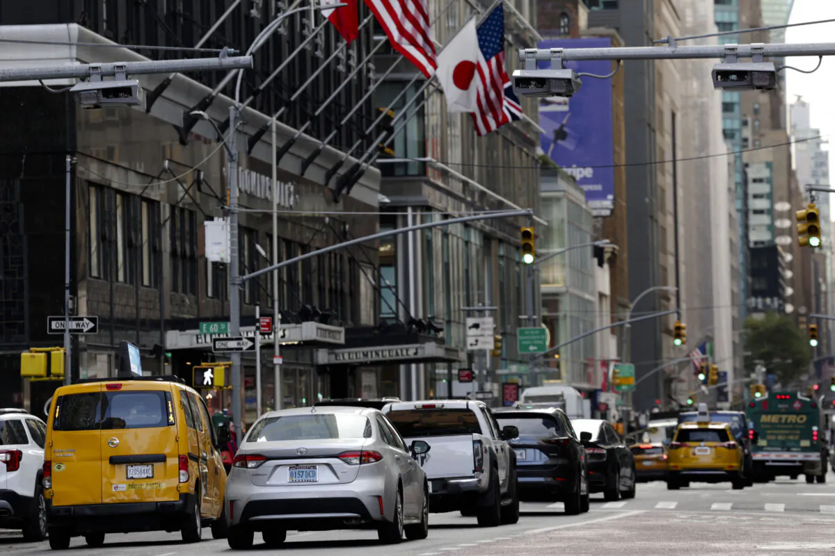 Traffic moves below congestion pricing machines on 59th St. and Lexington Ave. in New York City on  Nov. 14, 2024. (Kent J. Edwards/Reuters)