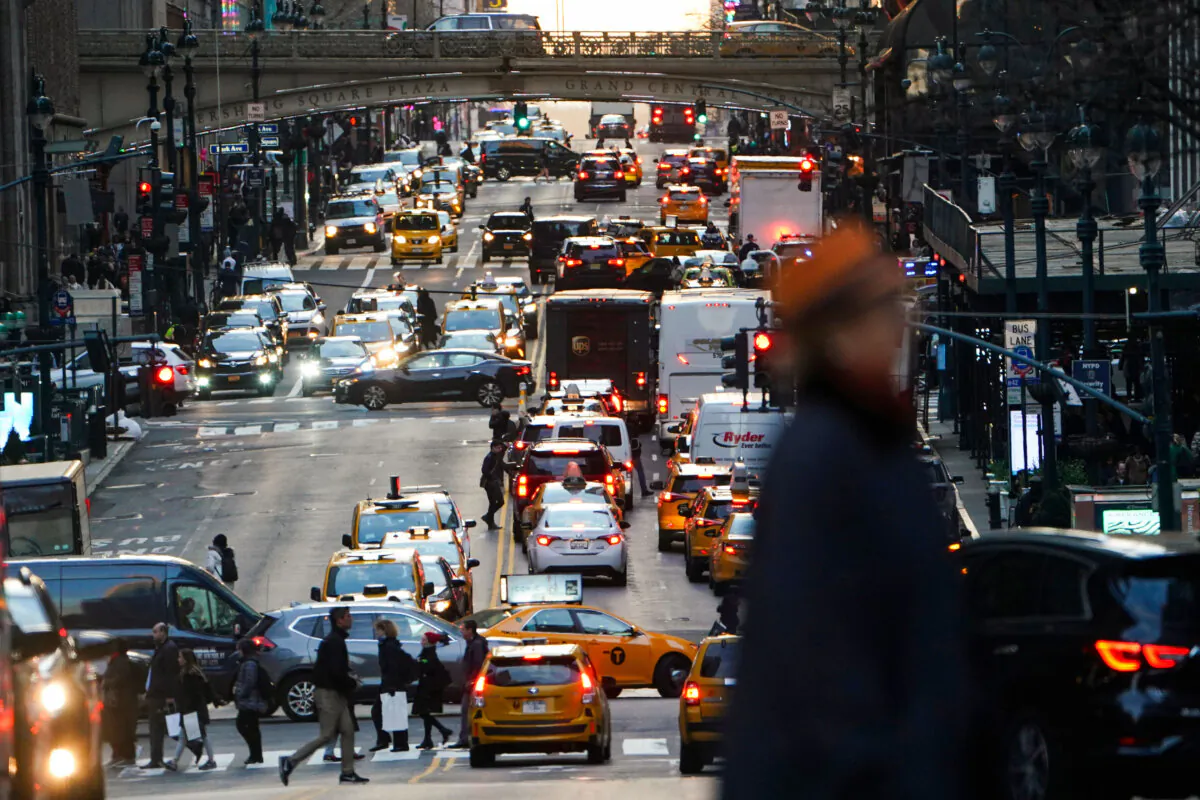 Traffic at twilight along 42nd Street in the Manhattan borough of New York City on March 27, 2019. (Carlo Allegri/Reuters)