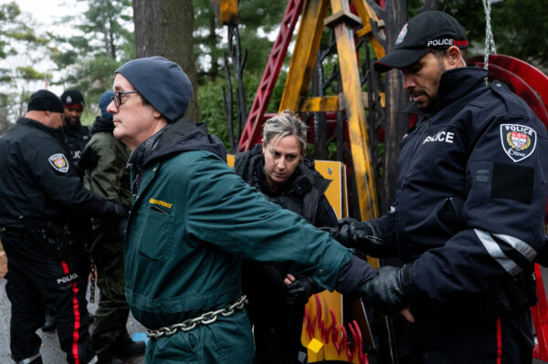 2 Arrested in Greenpeace Protest Outside Poilievre's Official Residence