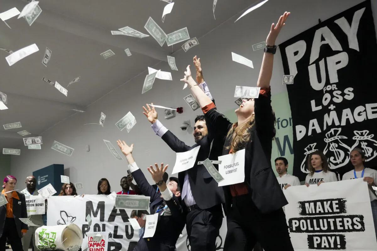 Activists participate in a demonstration for climate finance at the COP29 U.N. Climate Summit in Baku, Azerbaijan, on Nov. 21, 2024. (Sergei Grits /AP Photo)