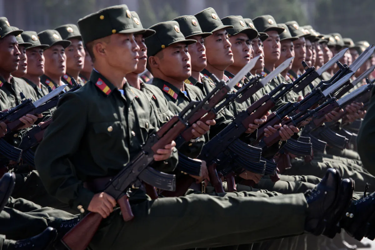 Korean People's Army soldiers march during a mass rally on Kim Il Sung square in Pyongyang, North Korea, on Sept. 9, 2018. (Ed Jones/ AFP via Getty Images)