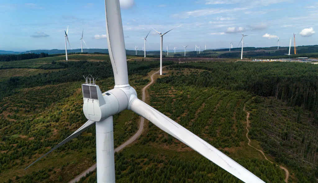Wind turbines dot the landscape at Pen y Cymoedd Wind Farm in Wales, the UK, on Aug. 1, 2024. (Carl Court/Getty Images)
