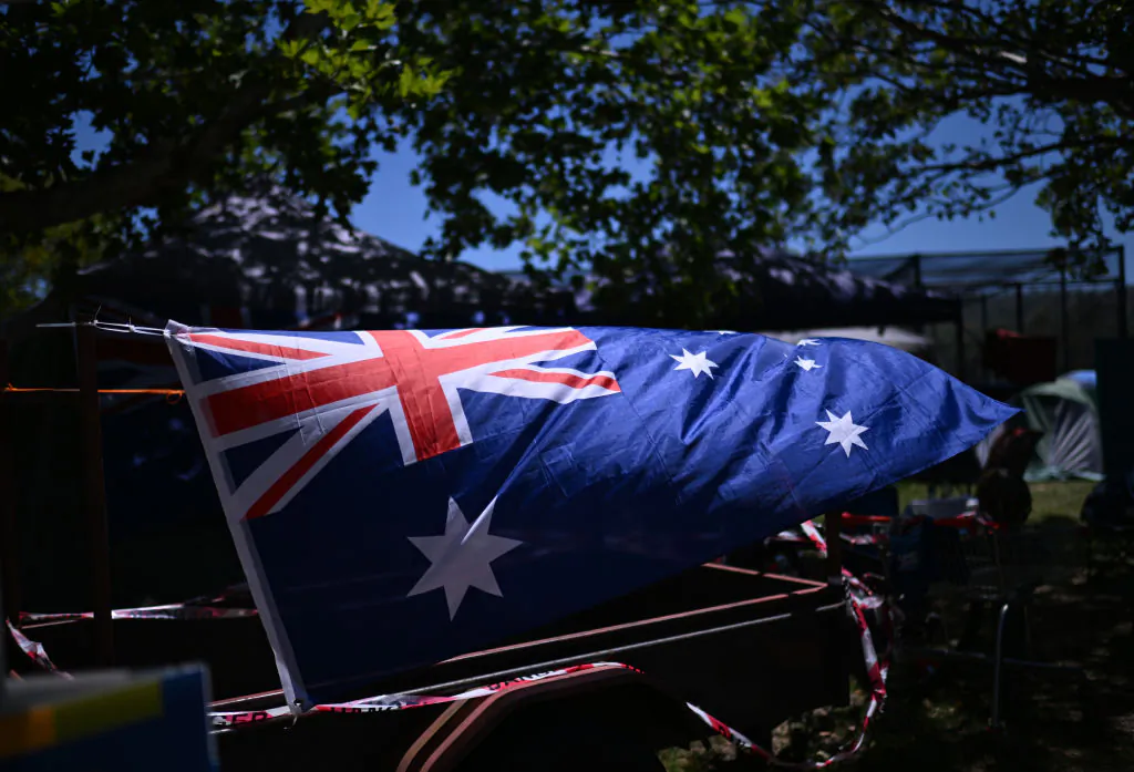The Australian flag is attached to a trailer at a campground during Australia Day in Tamworth, Australia, on Jan. 26, 2024. (Dan Peled/Getty Images)