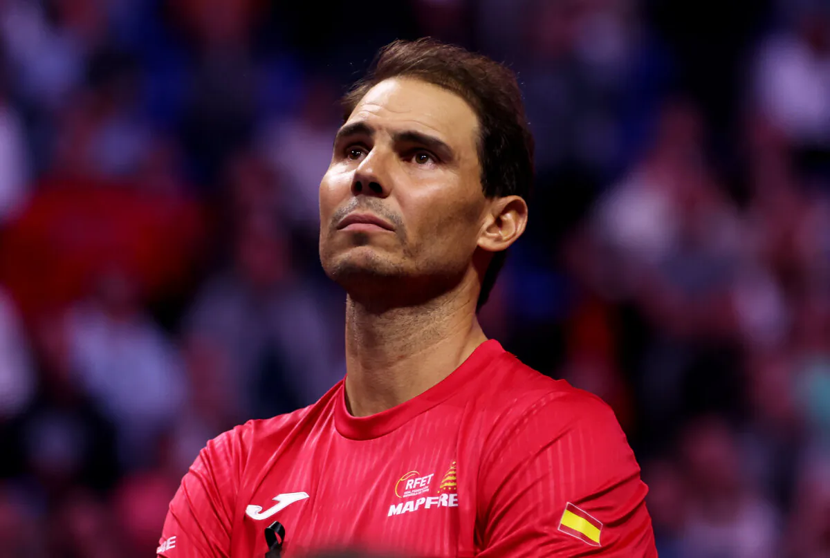 Rafael Nadal of Team Spain gets emotional while watching a video on the giants screens during his farewell after Spain being knocked out on the quarterfinal tie between Netherlands and Spain during the Davis Cup Finals at Palacio de Deportes Jose Maria Martin Carpena, in Malaga, Spain, on Nov. 19, 2024. (Clive Brunskill/Getty Images for ITF)