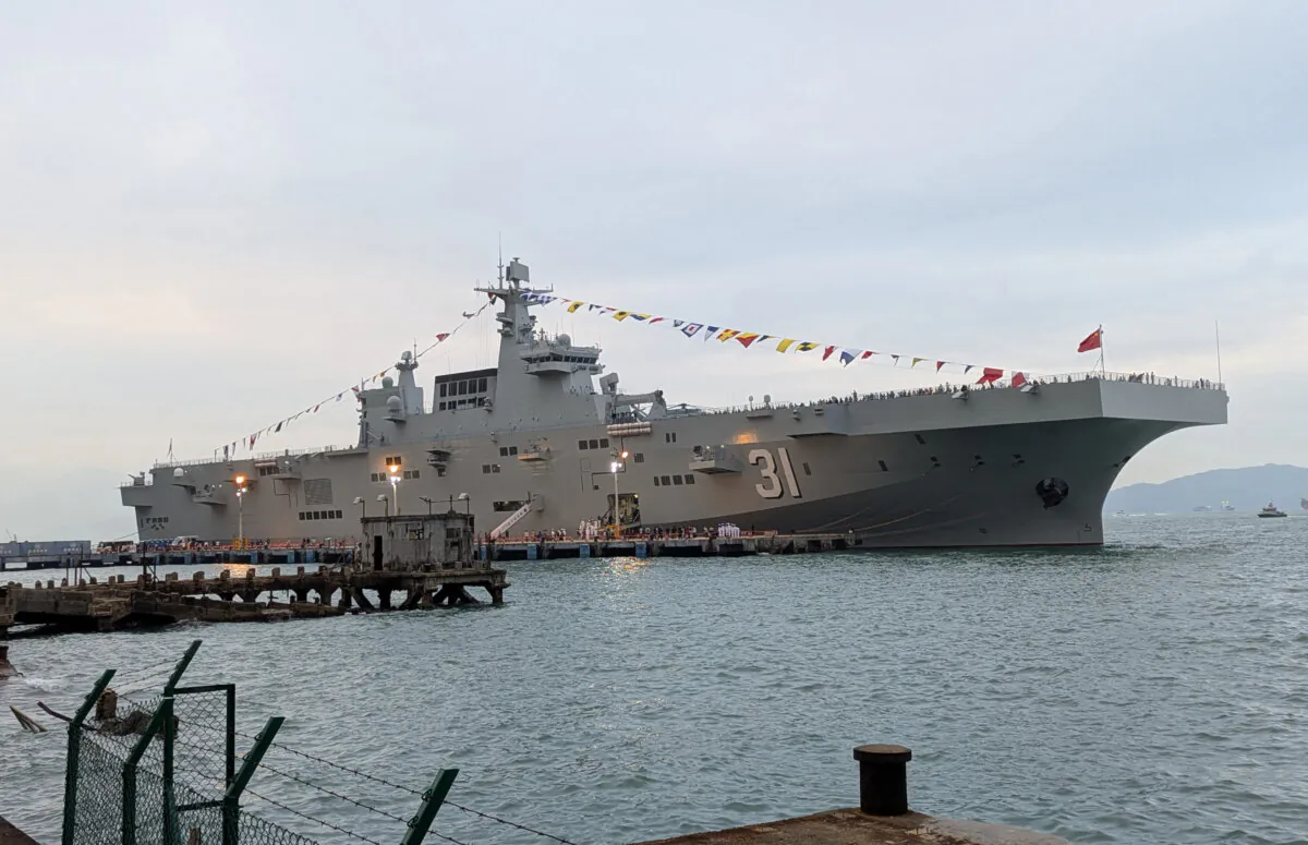 The amphibious assault ship, Hainan is docked at the China Merchants Wharf in Hong Kong on Nov. 24, 2024. (Holmes Chan/AFP via Getty Images)