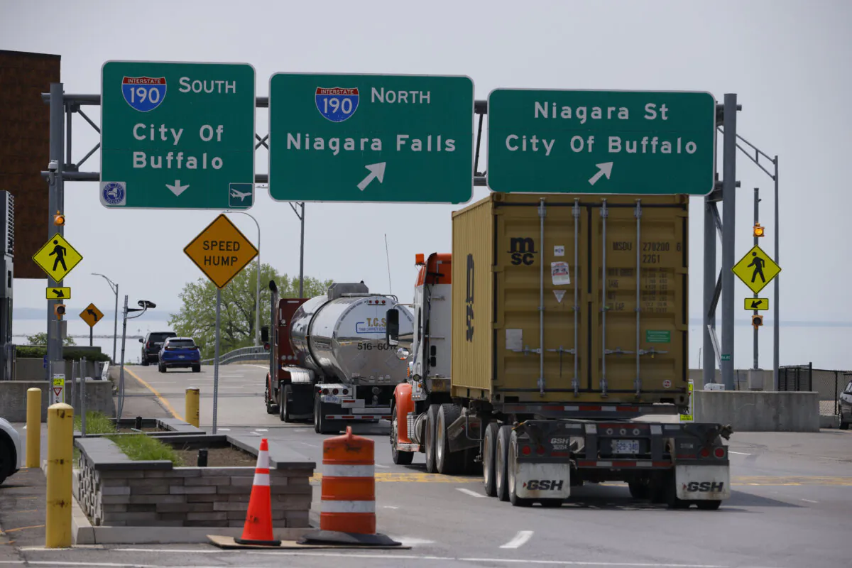 Trucks from Canada head through the Peace Bridge Port of Entry in Buffalo, N.Y., one of North America's busiest portals for international travel and trade, on May 23, 2023. (The Canadian Press/Cole Burston)