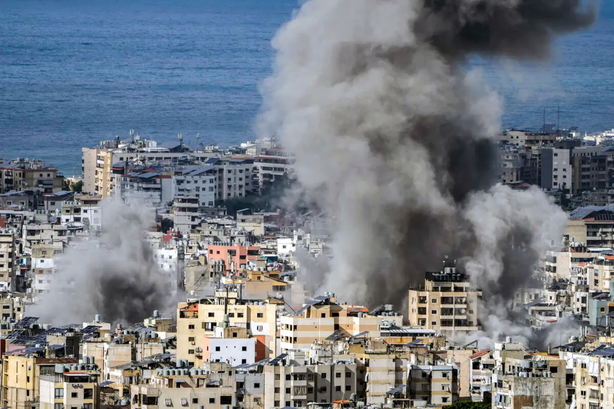 Smoke rises after an Israeli airstrike on Dahiyeh, in the southern suburb of Beirut, Lebanon, on Nov. 25, 2024. (AP Photo/Bilal Hussein)