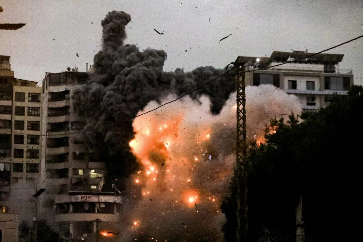 A fireball erupts from the site of an Israeli airstrike in Beirut, Lebanon, on Nov. 25, 2024. (-/AFP via Getty Images)