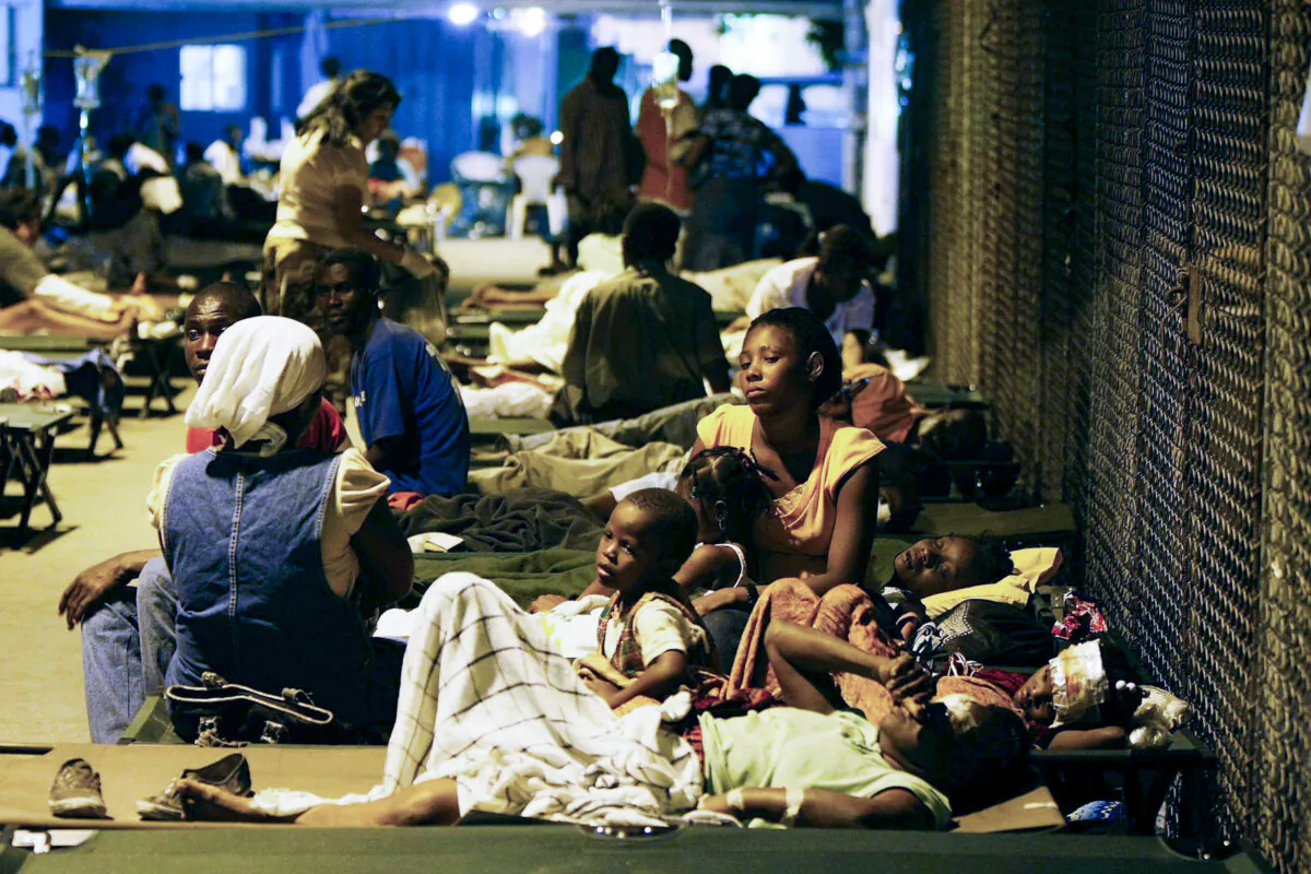 Injured people at a makeshift field hospital in Port-au-Prince, Haiti, in this file photo. (Joe Raedle/Getty Images)