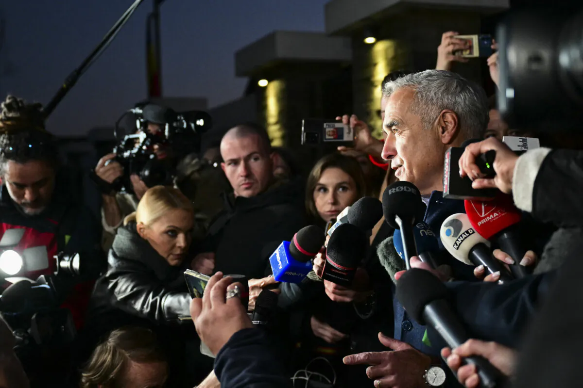 Calin Georgescu speaks with journalists in Izvorani, Romania, on Nov. 26, 2024. (Daniel Mihailescu/AFP via Getty Images)