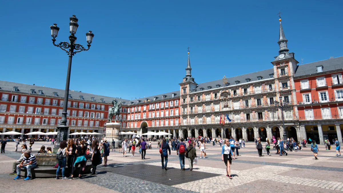 Madrid's cobbled Plaza Mayor has seen centuries of history, from bullfights to carnival celebrations to gruesome events of the Inquisition. (Cameron Hewitt, Rick Steves' Europe)