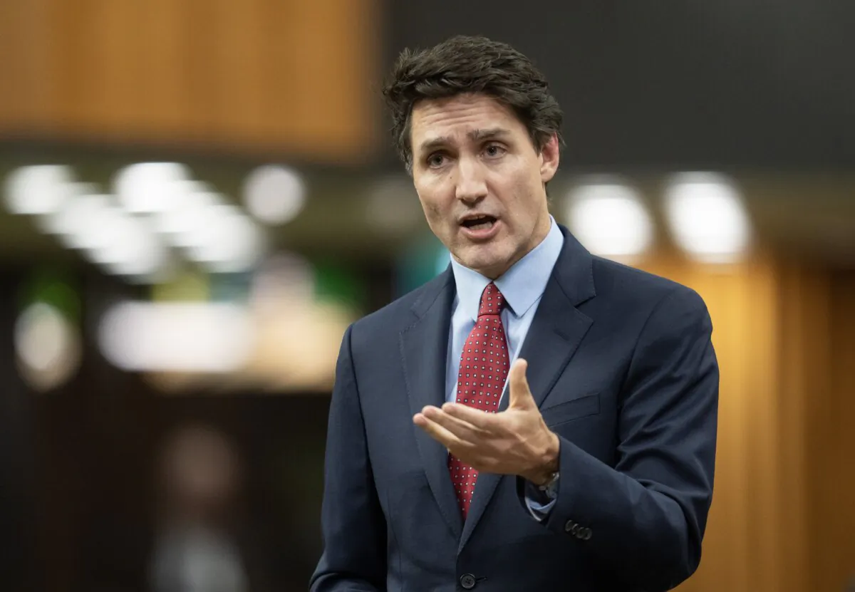 Prime Minister Justin Trudeau rises to respond to questions from the opposition during question period, in Ottawa on Nov. 26, 2024. (The Canadian Press/Adrian Wyld)