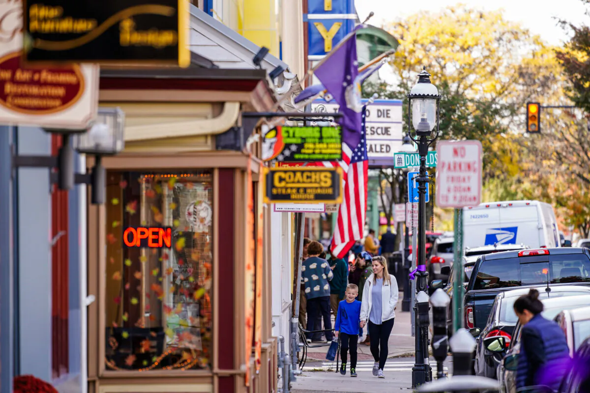 People walk past small businesses in Doylestown, Pa., on Nov. 4, 2021. (Matt Rourke/AP Photo)